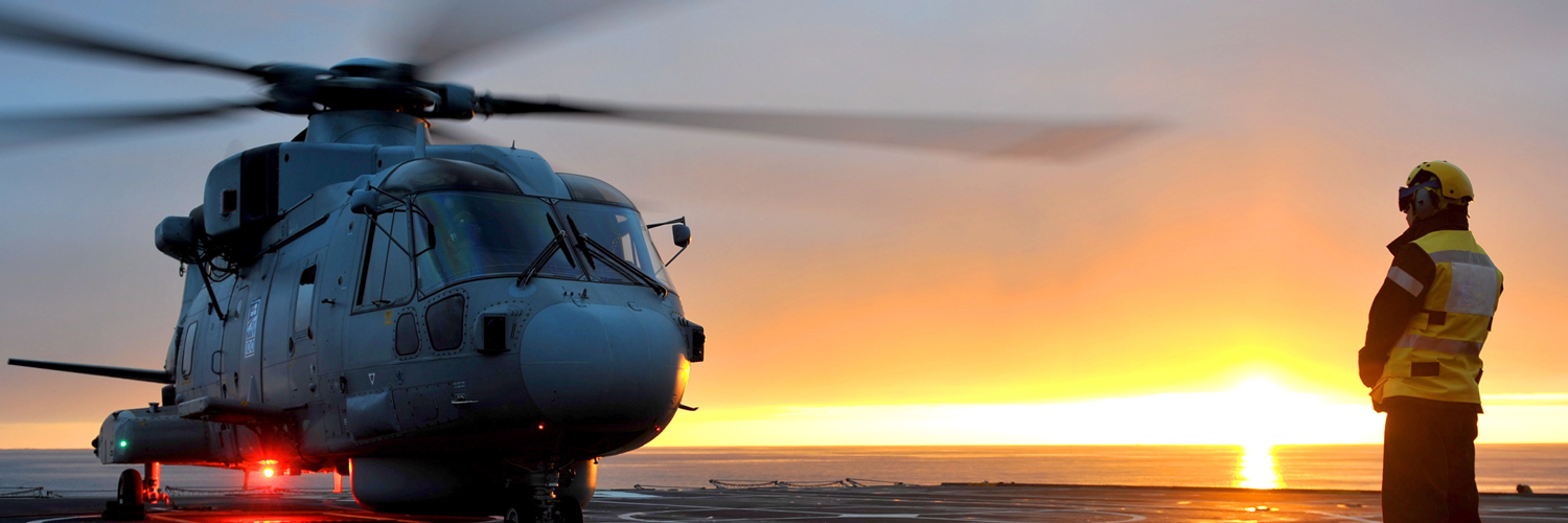 shot of a helicopter at sunset.
