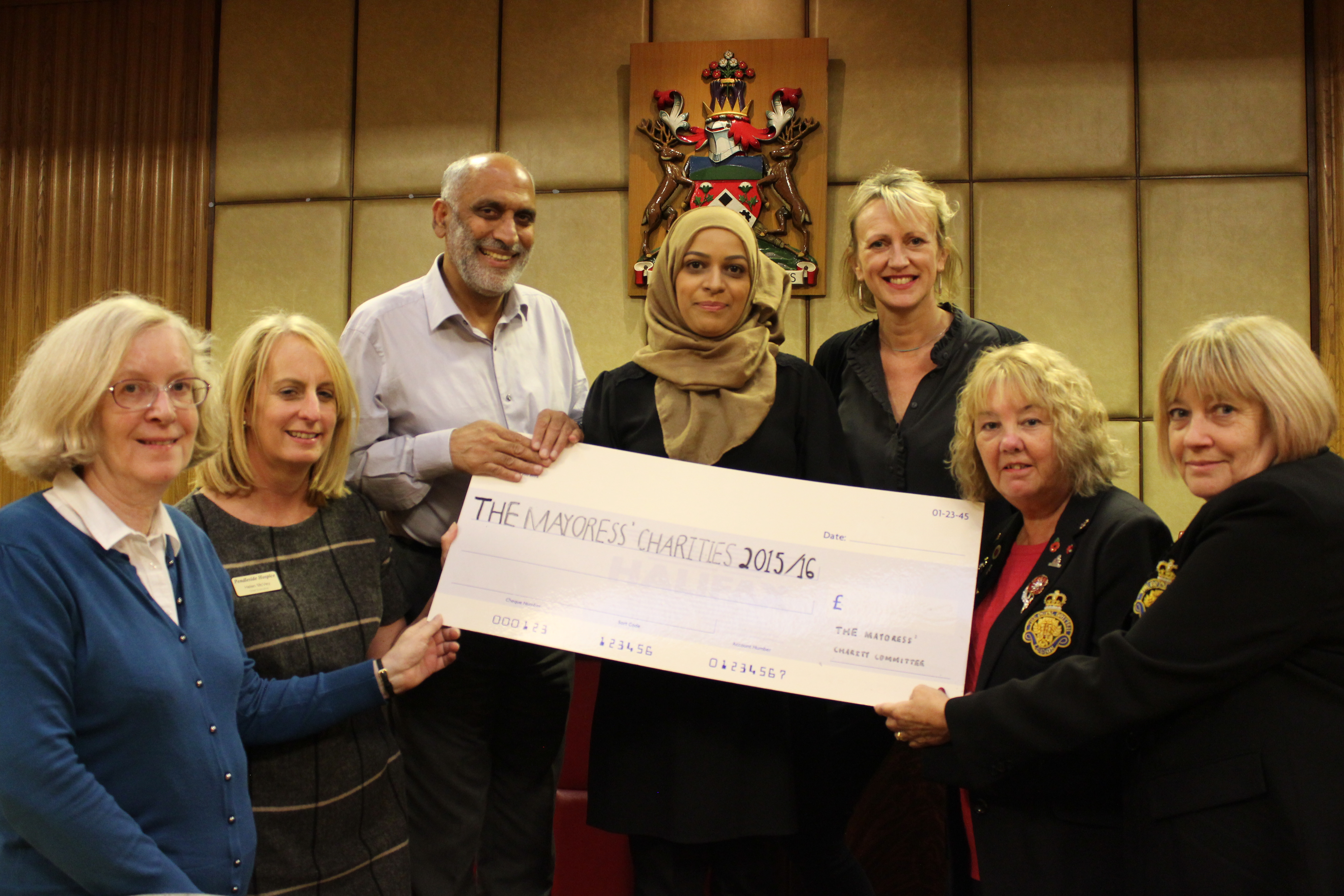 A photo of former Mayor & Mayoress charity cheque handovers