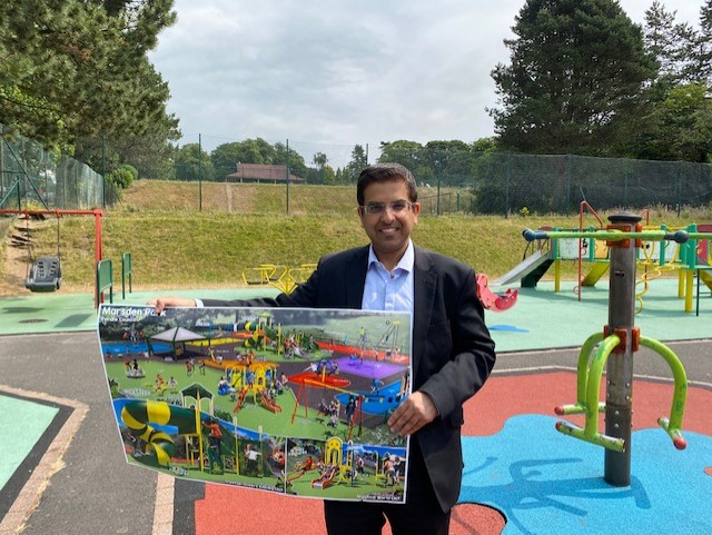 Councillor Nadeem Ahmed with plans at Marsden Park
