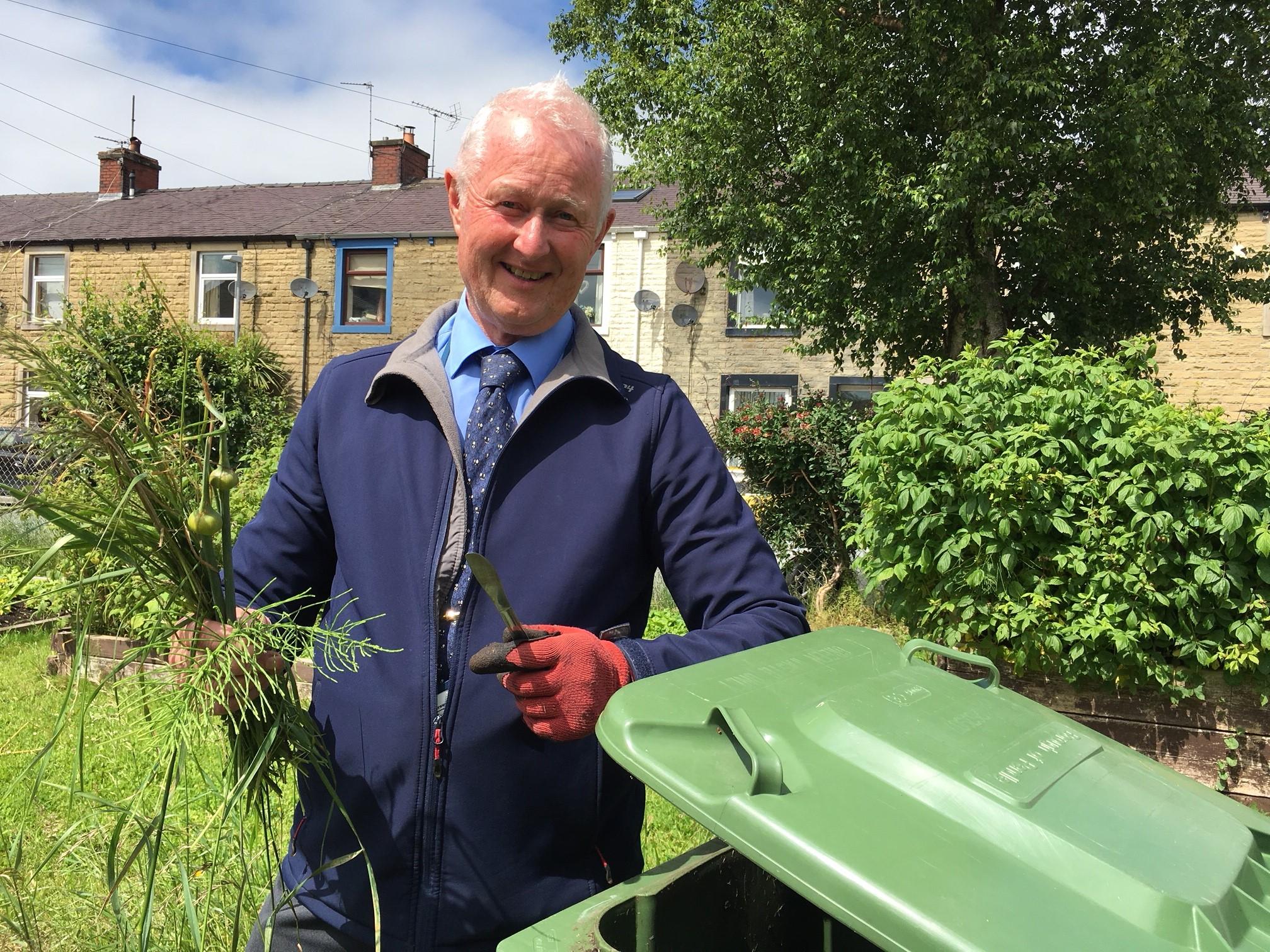 David Lambert with green bin