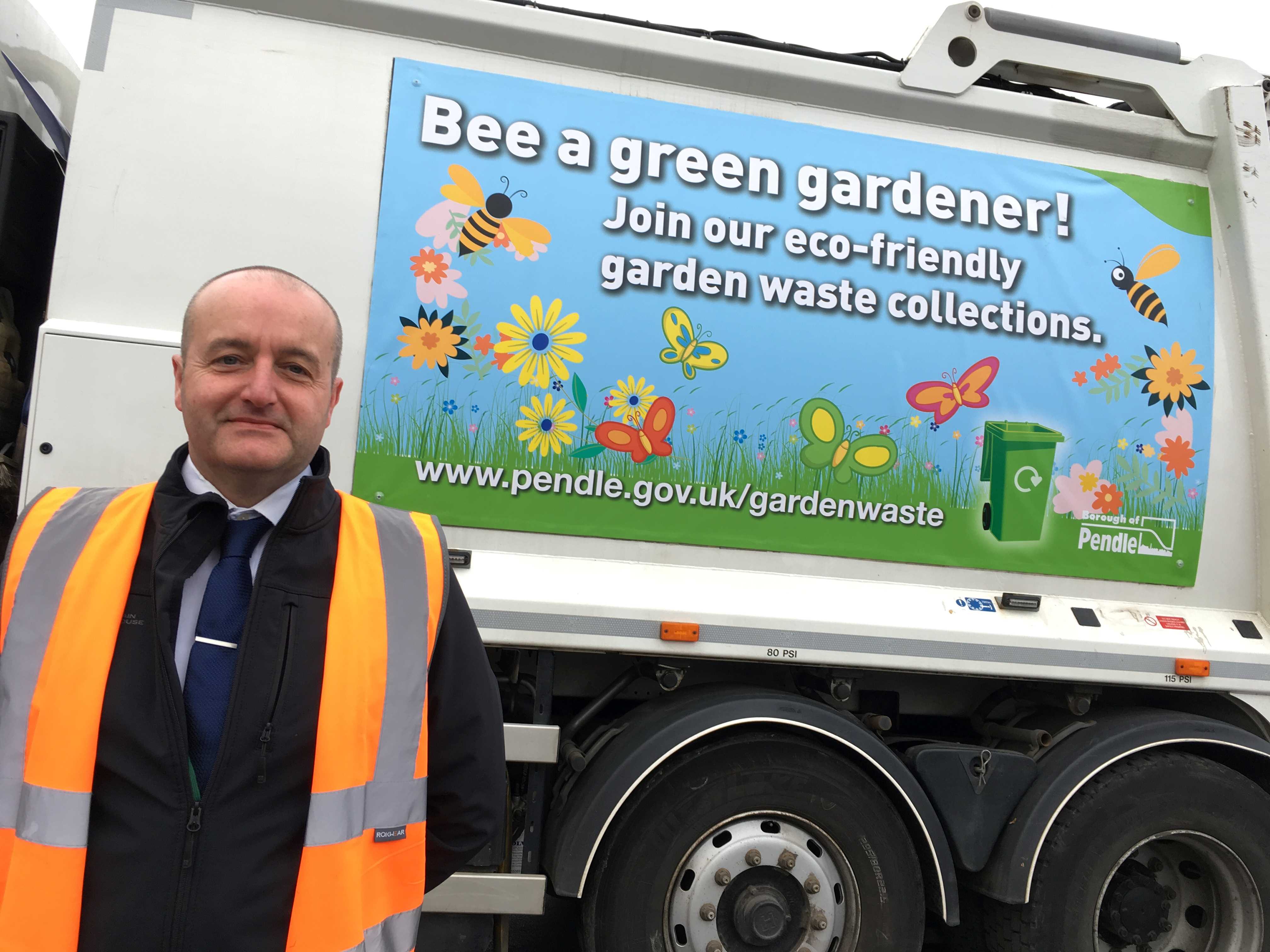 David Walker with one of the new bin wagon graphics to promote garden waste recycling