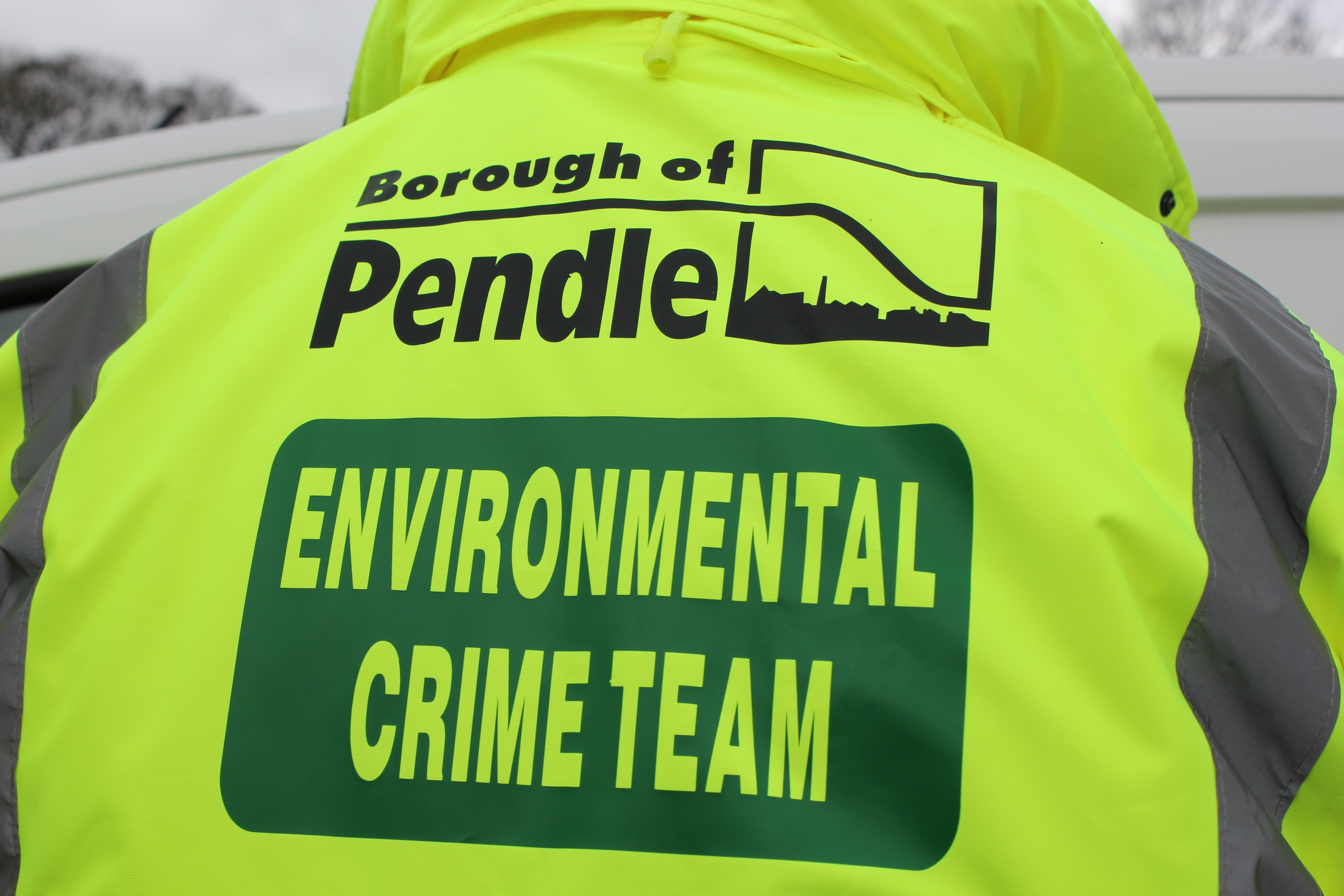 Photograph showing high vis jacket worn by Environmental Crime Team staff.