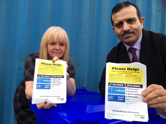 Photo of Waste & Recycling Co-ordinator Carole Taylor & Leader of the Council, Councillor Iqbal with the blue bin stickers